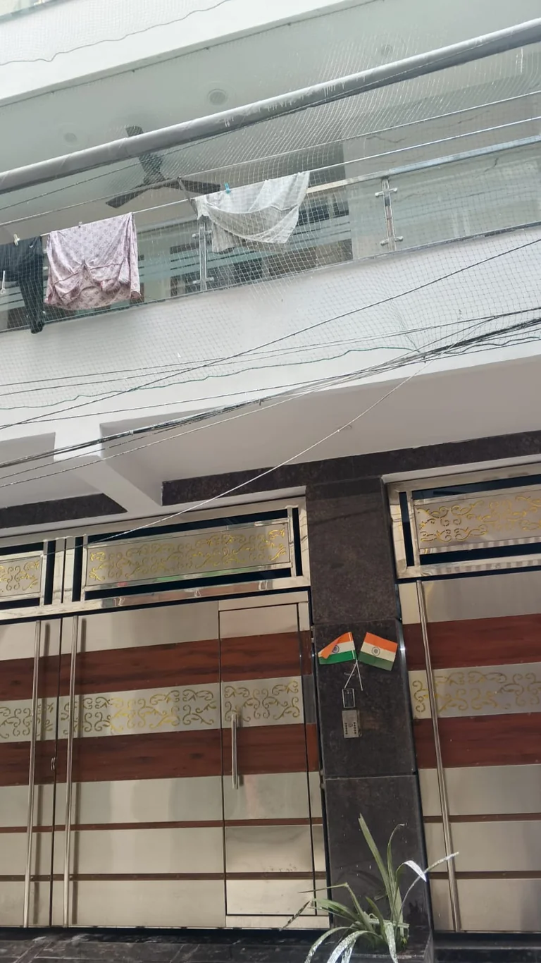 Kings Hostel entrance gates at A-35, Suraj Vihar, Dwarka.